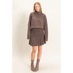 TURTLENECK SWEATER AND PLEATED A-LINE SKIRT