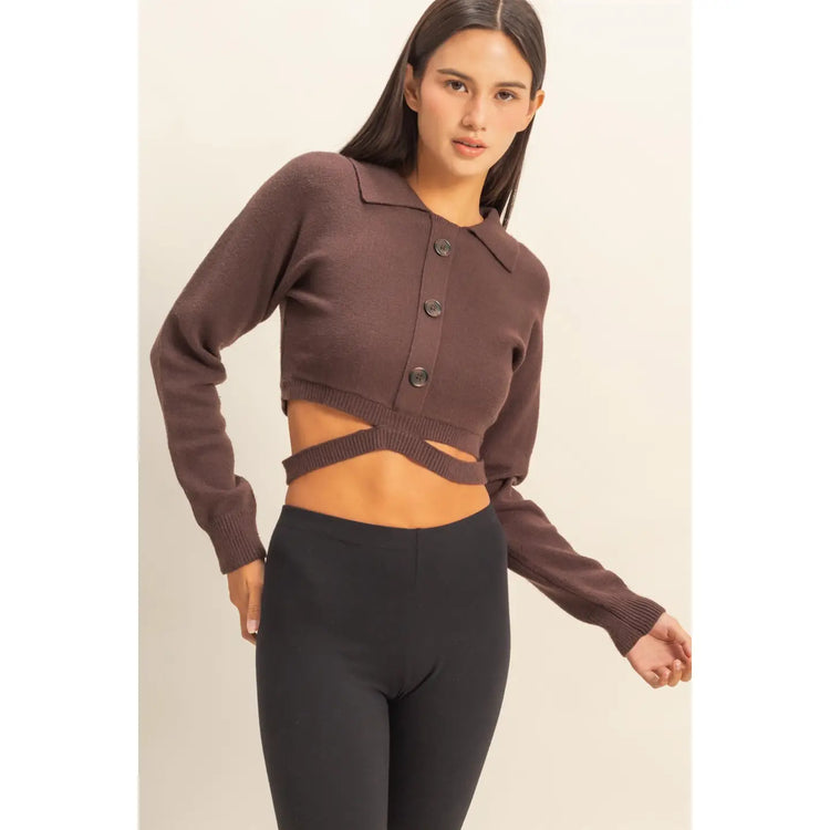 SEXY CROPPED CARDIGAN in Dark Chocolate worn with black leggings, featuring stylish buttons and a trendy cut-out design.