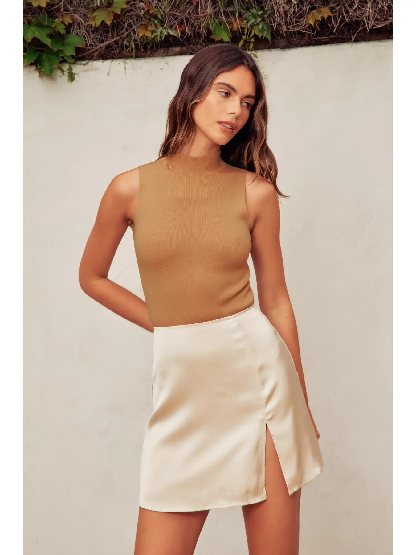 The Megan Turtleneck Tank Knitted Bodysuit in rich camel