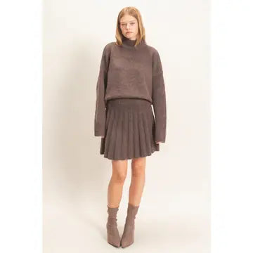 TURTLENECK SWEATER AND PLEATED A-LINE SKIRT